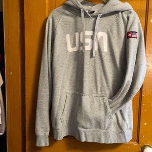 The North Face size medium women’s grey hooded sweatshirt